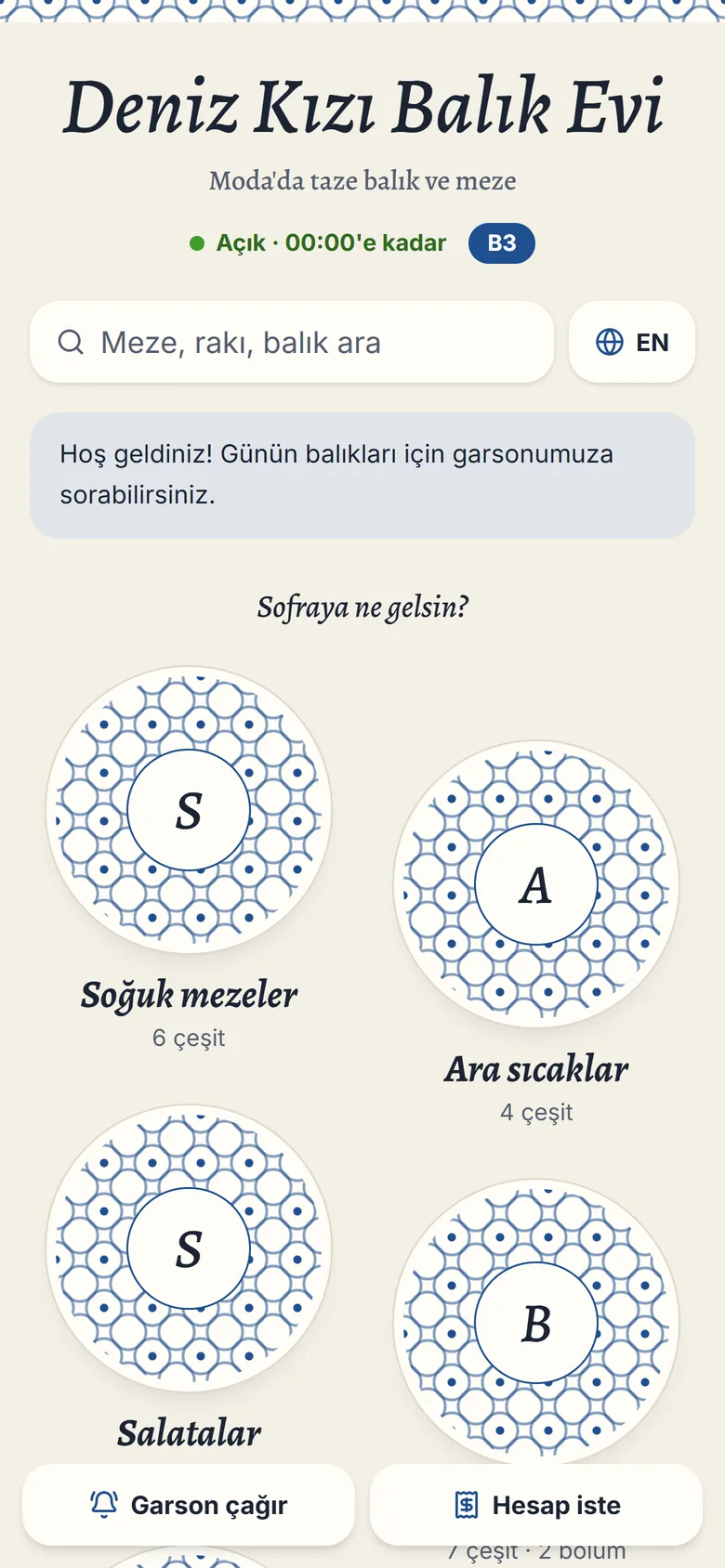 Meyhane Sofrası tasarımında kategoriler çini desenli tabaklar olarak dizilmiş